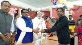 সাপাহারে আদিবাসী শিক্ষার্থীদের মাঝে শিক্ষা উপকরণ বিতরণ