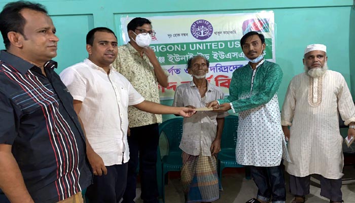 নবীগঞ্জ দূর্গতদের মাঝে নগদ অর্থ বিতরন